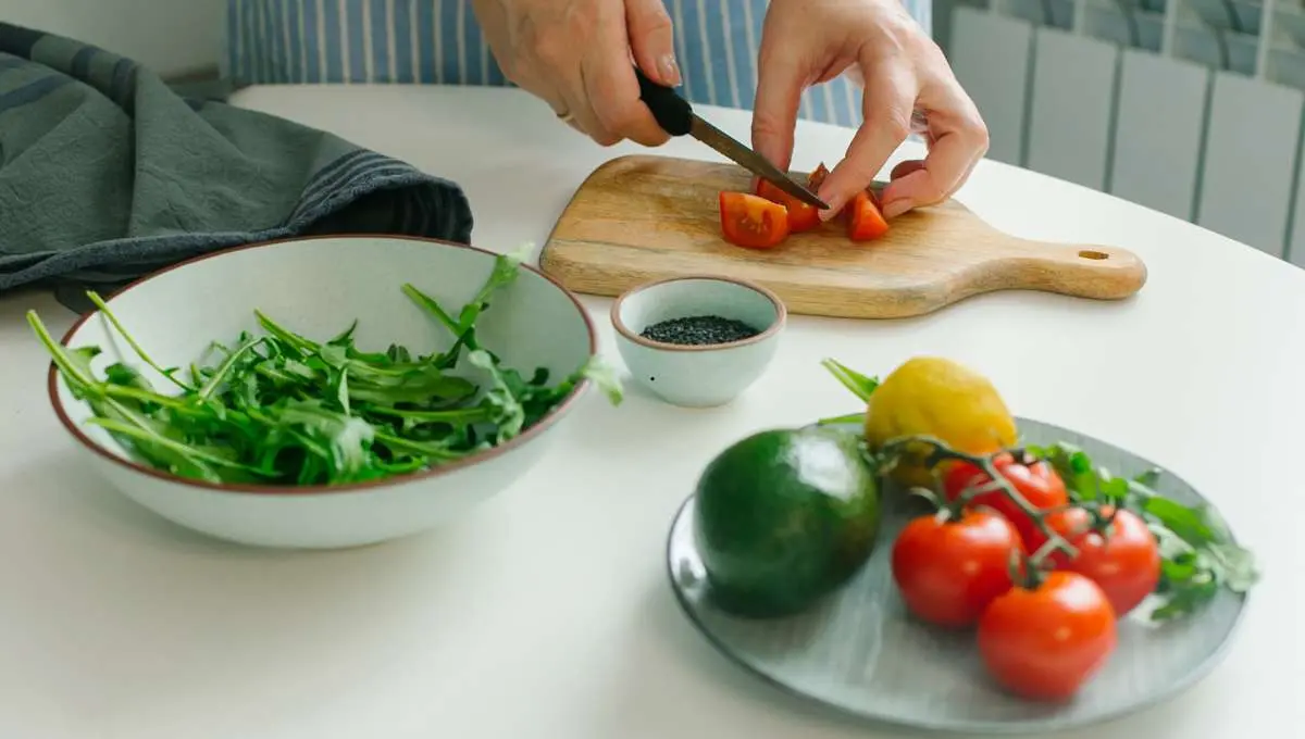 A chef cutting vegetables