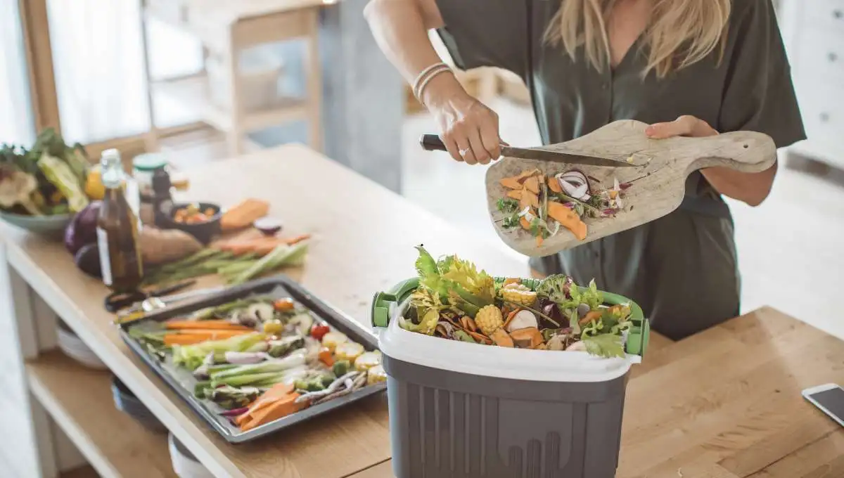 a woman arranging vegetables leftovers